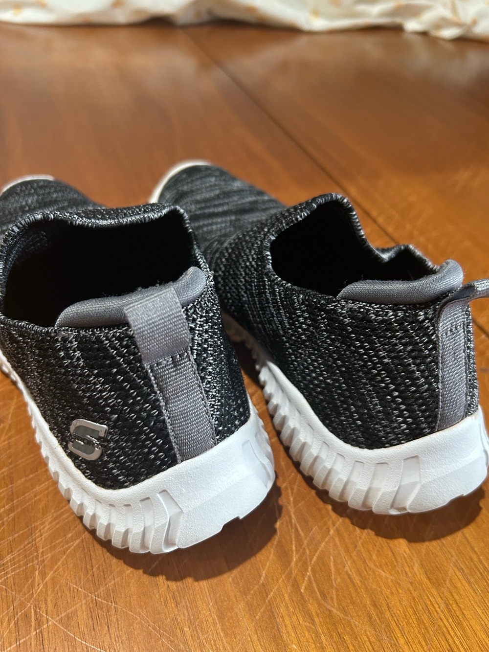 Skechers Black & White Slip-On Knit Sneakers - Picture 6 of 7